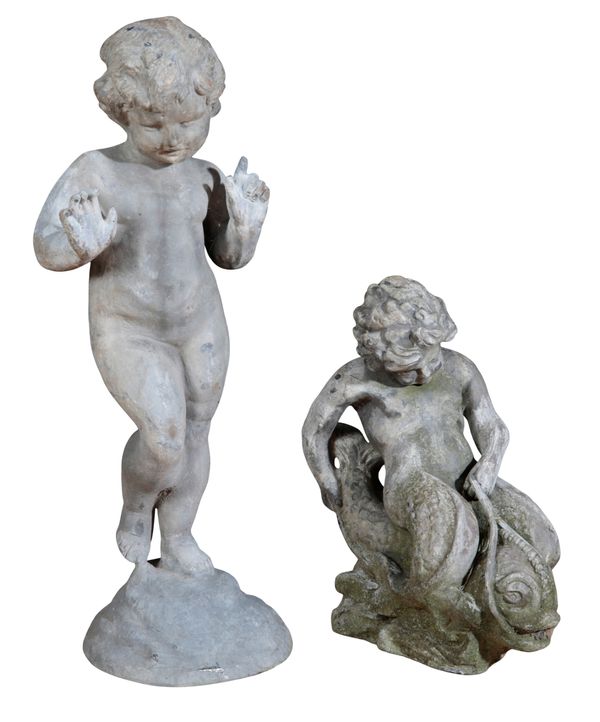 A LEAD GARDEN FIGURE OF A MERMAID ASTRIDE A BRIDLED DOLPHIN