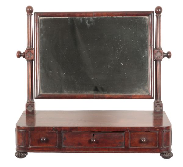 A WILLIAM IV MAHOGANY DRESSING MIRROR IN THE MANNER OF GILLOWS