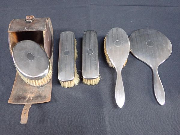 A SILVER BACKED DRESSING TABLE SET