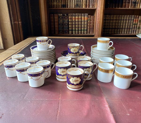 A GROUP OF THREE PORCELAIN PART COFFEE SERVICES
