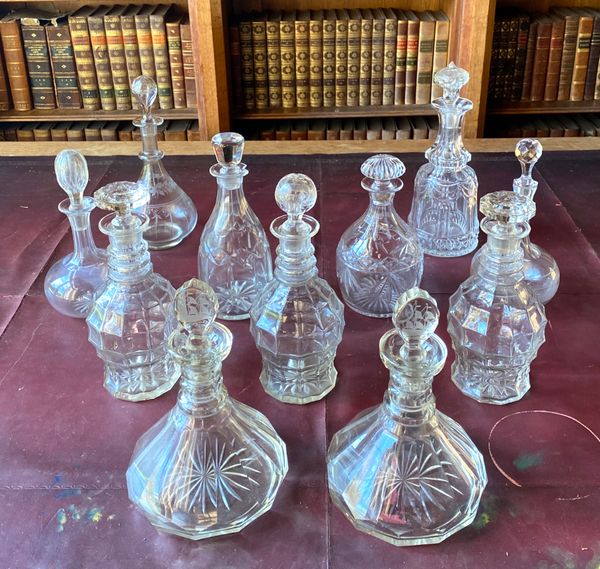 A COLLECTION OF CUT-GLASS DECANTERS