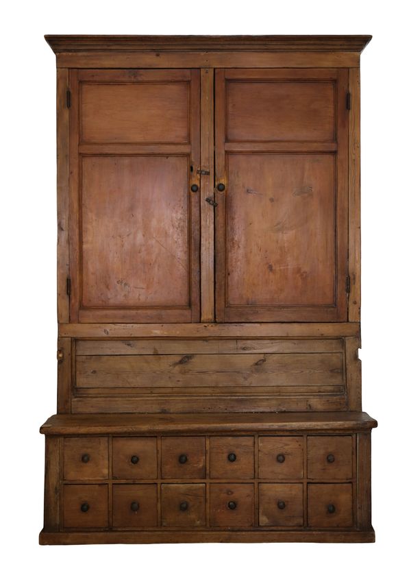 A PINE CUPBOARD-BACK SETTLE