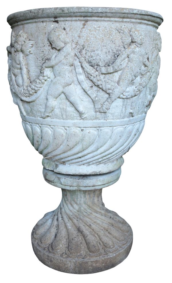 A LARGE PAIR OF RECONSTITUTED STONE PUTTI URNS