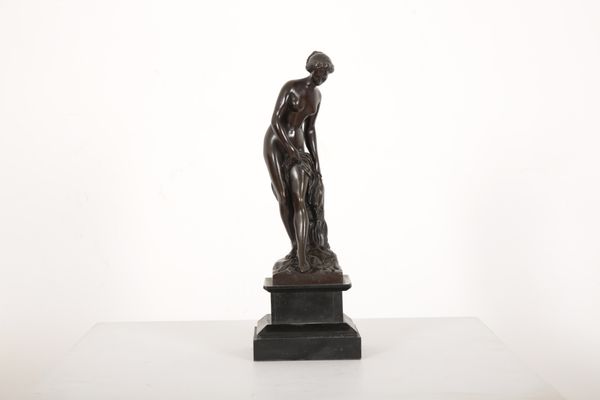 A BRONZE FIGURE OF 'BAGNEUSE' AFTER ETIENNE MAURICE FALCONET (1716-1791)