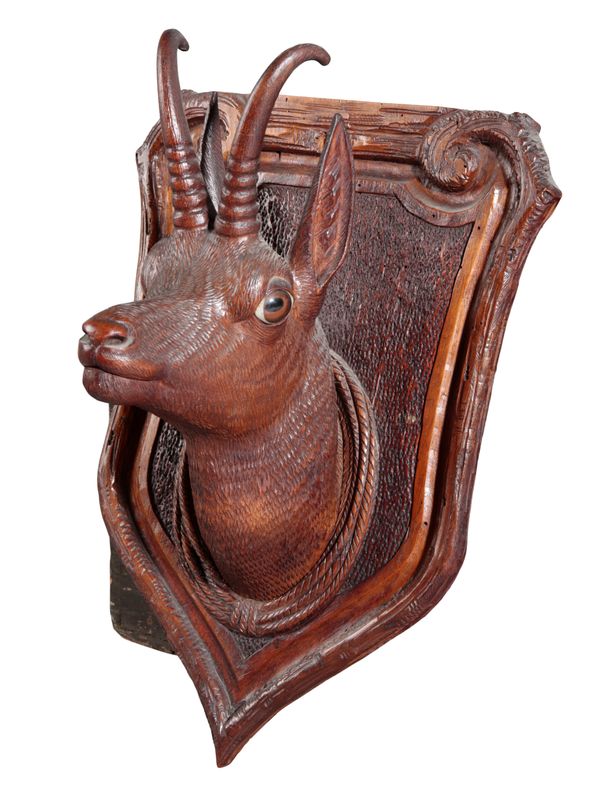 A BLACK FOREST CARVING OF A CHAMOIS NECK MOUNT