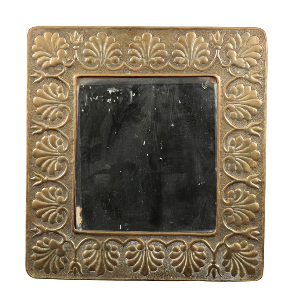 AN ARTS AND CRAFTS EMBOSSED BRASS RECTANGULAR WALL MIRROR