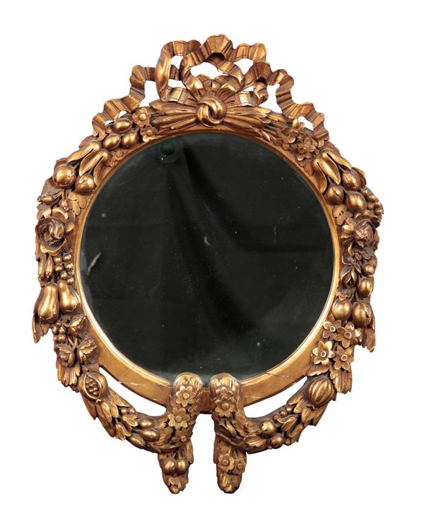 A GILTWOOD CARVED MIRROR