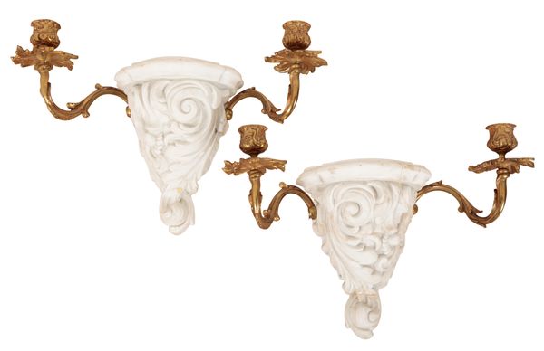 A PAIR OF WHITE CERAMIC TWO BRANCH WALL SCONCES