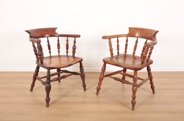 A MATCHED PAIR OF SMOKER'S BOW ARMCHAIRS