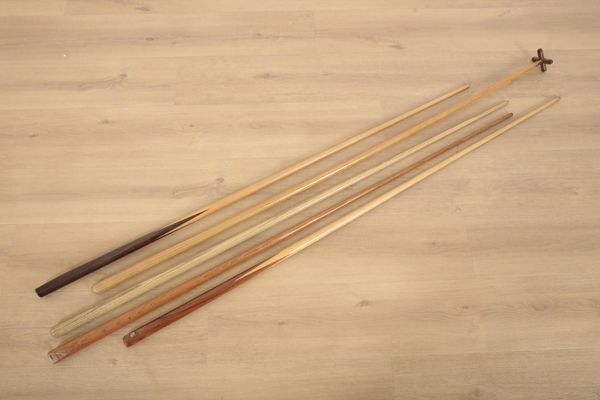 A COLLECTION OF FOUR SNOOKER CUES