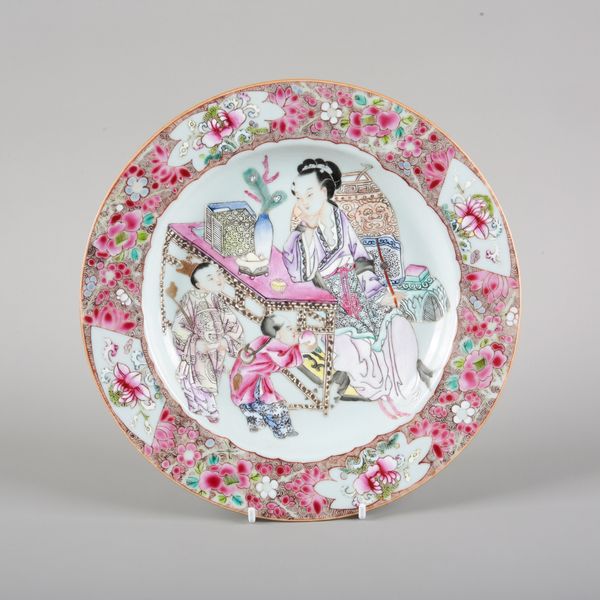 A CHINESE PORCELAIN FAMILLE ROSE 'LADY AND CHILDREN' PLATE
