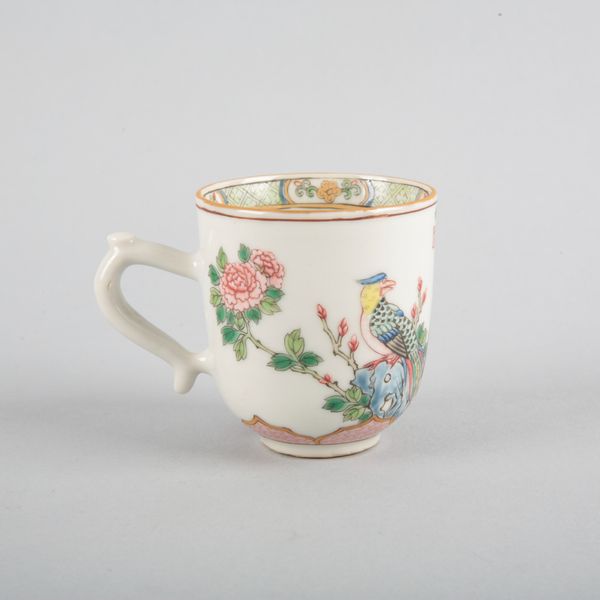 A CHINESE PORCELAIN FAMILLE ROSE TEACUP