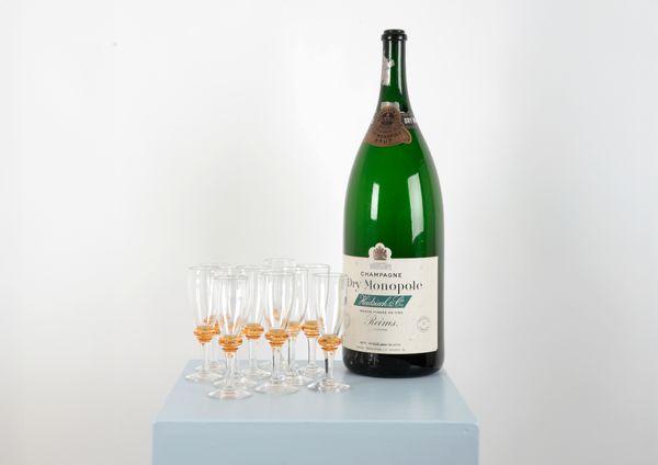 A SET OF TEN BELLE WALKER STUDIO ART GLASS CHAMPAGNE FLUTES