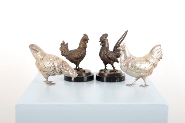 A COLLECTION OF METALWARE CHICKENS