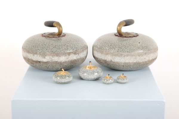 A PAIR OF BLUE GRANITE CURLING STONES