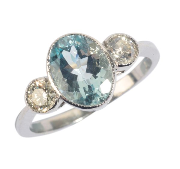 AN AQUAMARINE AND DIAMOND THREE STONE RING