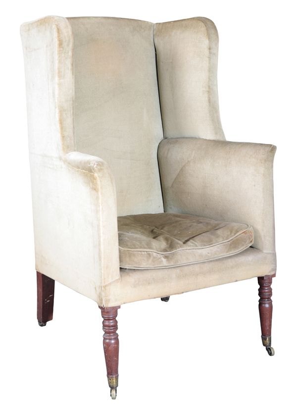A REGENCY MAHOGANY WING ARMCHAIR
