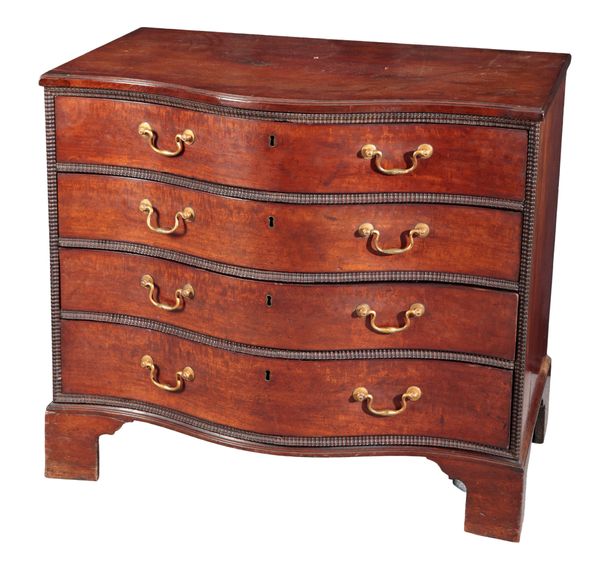 A GEORGE III MAHOGANY SERPENTINE CHEST OF DRAWERS