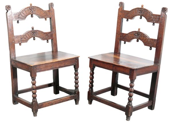 A PAIR OF DERBYSHIRE OAK CHAIRS
