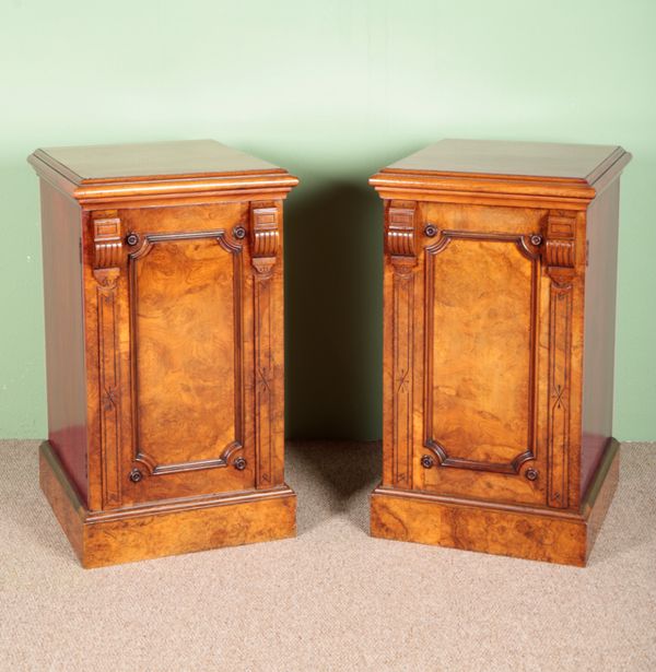 A PAIR OF VICTORIAN WALNUT PEDESTAL CHESTS