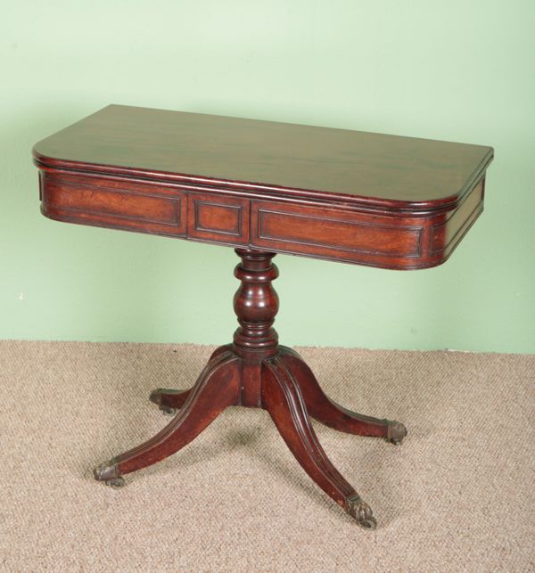 A MAHOGANY TEA TABLE