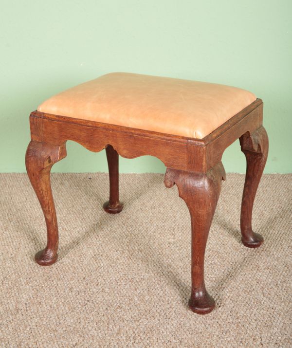 A QUEEN ANNE STYLE OAK STOOL