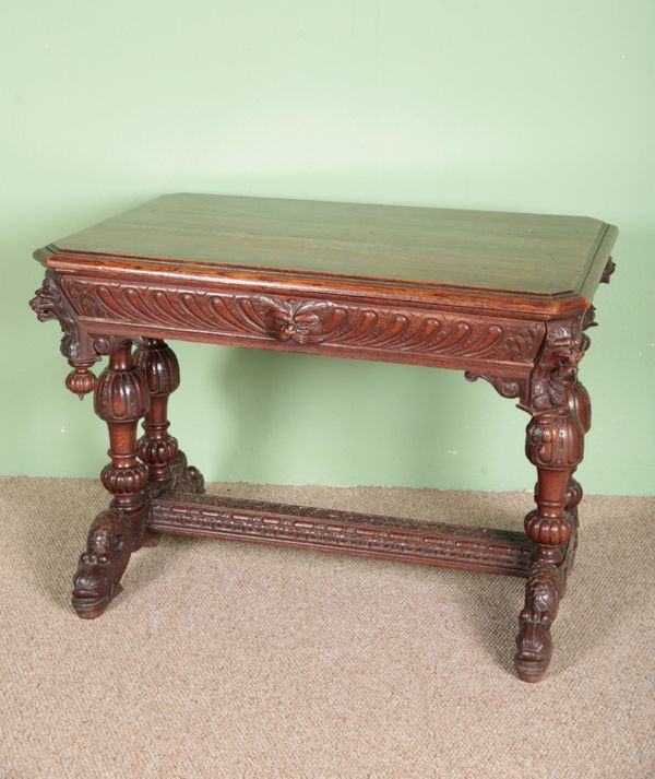 A VICTORIAN GOTHIC OAK CENTRE TABLE