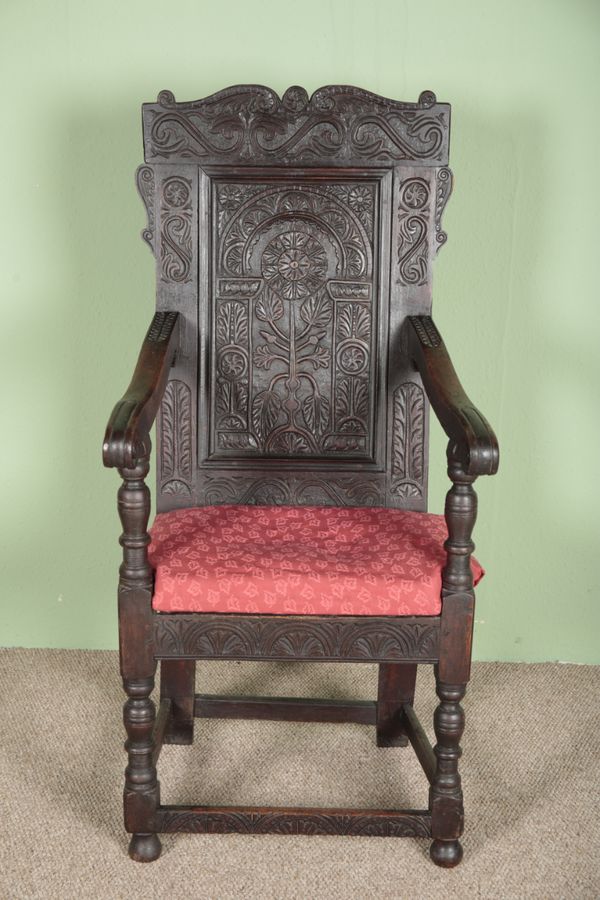 AN OAK WAINSCOT CHAIR