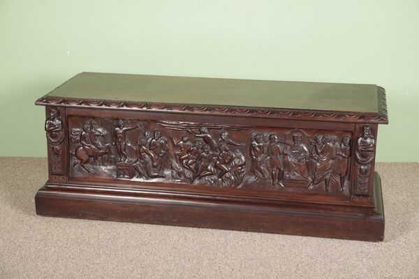 AN ITALIAN CARVED WOOD CASSONE