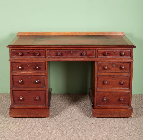 A VICTORIAN MAHOGANY PEDESTAL DESK