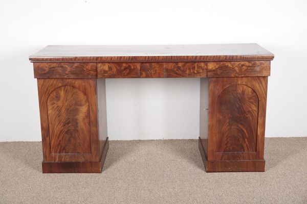 A VICTORIAN FLAME MAHOGANY TWIN PEDESTAL SIDEBOARD