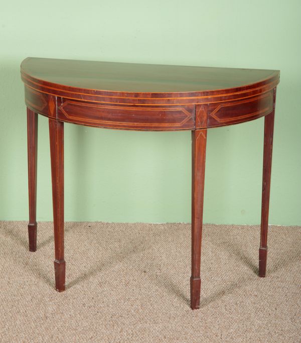 A GEORGE III MAHOGANY DEMI-LUNE CARD TABLE