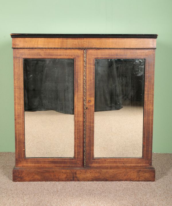 A REGENCY WALNUT PIER CABINET