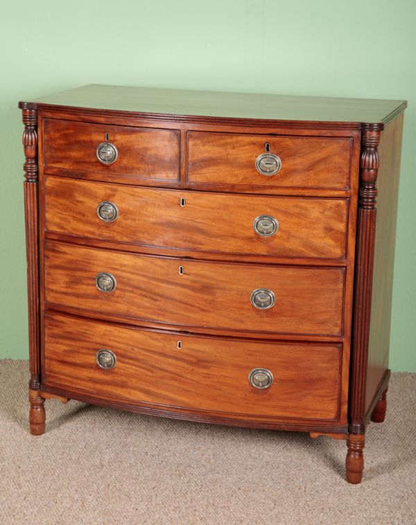 A REGENCY MAHOGANY BOWFRONT CHEST OF DRAWERS