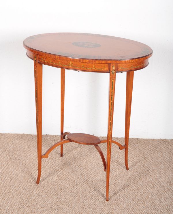 AN EDWARDIAN POLYCHROME AND SATINWOOD OVAL OCCASIONAL TABLE