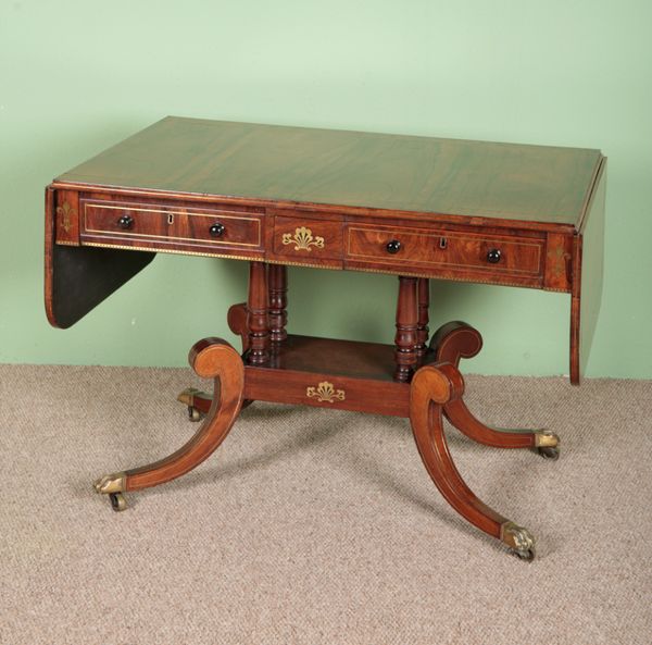 A REGENCY ROSEWOOD SOFA TABLE