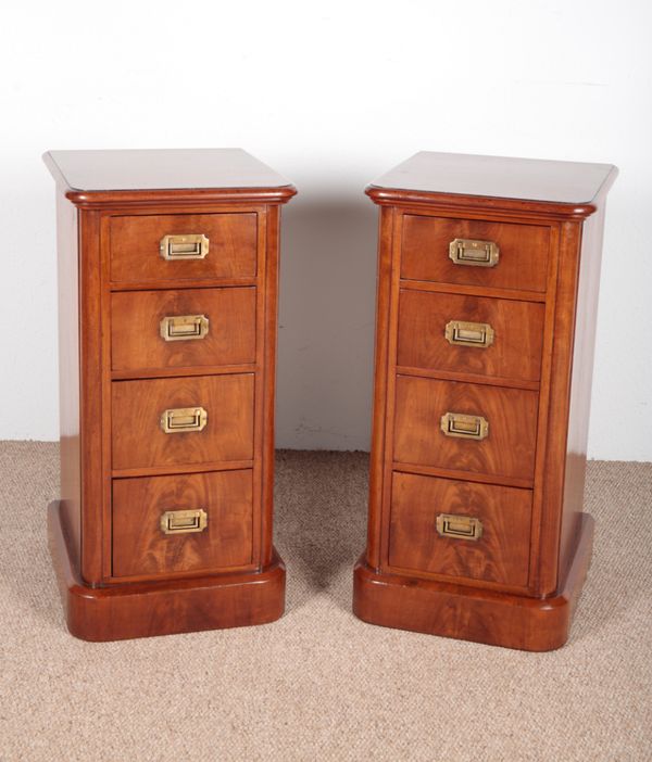 A PAIR OF VICTORIAN FLAME MAHOGANY PEDESTAL CHESTS