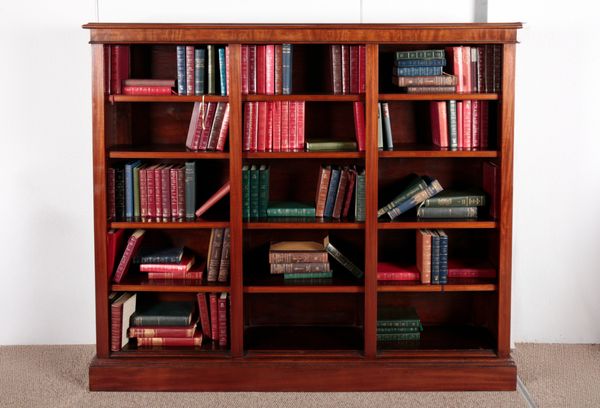 AN EDWARDIAN THREE-SECTION MAHOGANY OPEN BOOKCASE