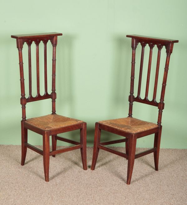 A PAIR OF FRENCH OAK GOTHIC STYLE CHAIRS