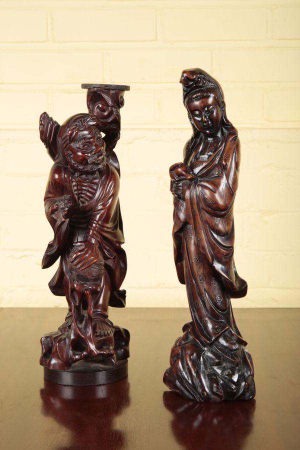 A CHINESE HARDWOOD FIGURE OF GUANYIN