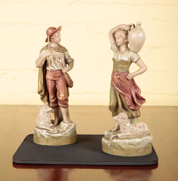 A PAIR OF ROYAL DUX FIGURINES