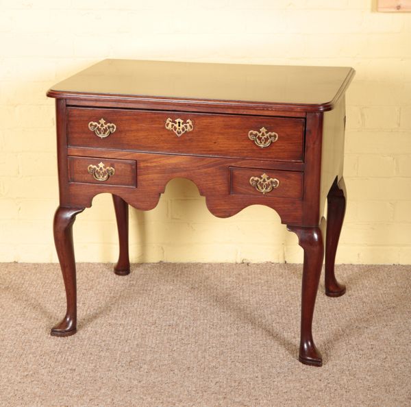 A GEORGE II RED WALNUT LOWBOY