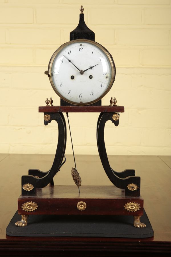 A CONTINENTAL 'BIEDERMEIER' MANTEL CLOCK