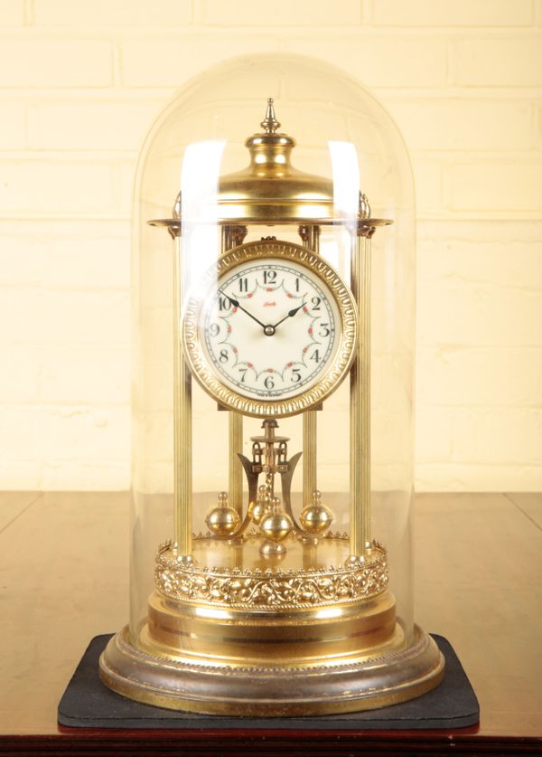 A GILT BRASS ANNIVERSARY CLOCK BY KIENINGER AND OBERGFELL