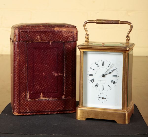 A FRENCH BRASS REPEATING CARRIAGE ALARM CLOCK BY THE GOLDSMITHS AND SILVERSMITHS COMPANY