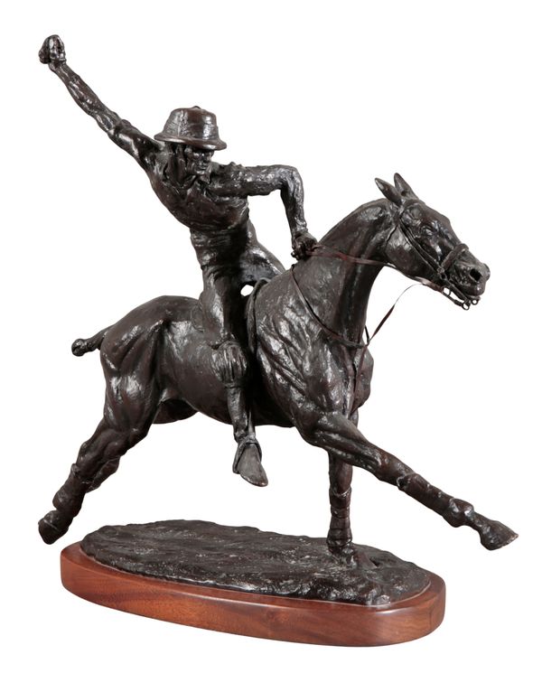 A BRONZE SCULPTURE OF A POLO PLAYER ON HORSEBACK