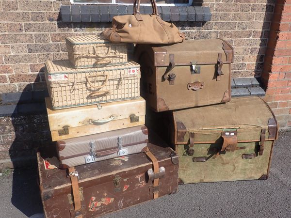 TWO VICTORIAN CANVAS COVERED WICKER TRUNKS