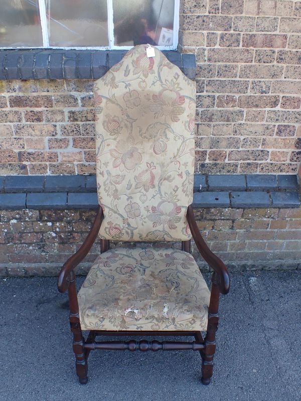 AN EARLY 18th CENTURY WALNUT ARMCHAIR