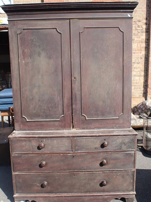 A 19TH CENTURY SIMULATED MAHOGANY HOUSEKEEPER'S CUPBOARD