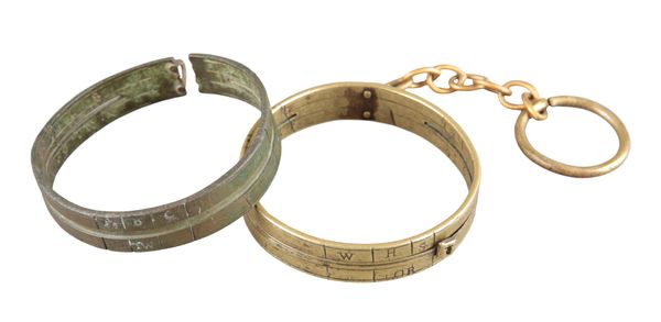 A BRASS RING DIAL OR POCKET SUNDIAL
